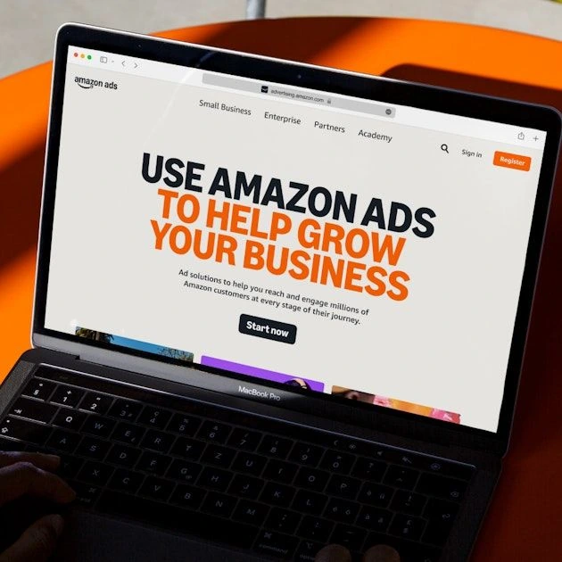 Amazon Ads website shown on a laptop