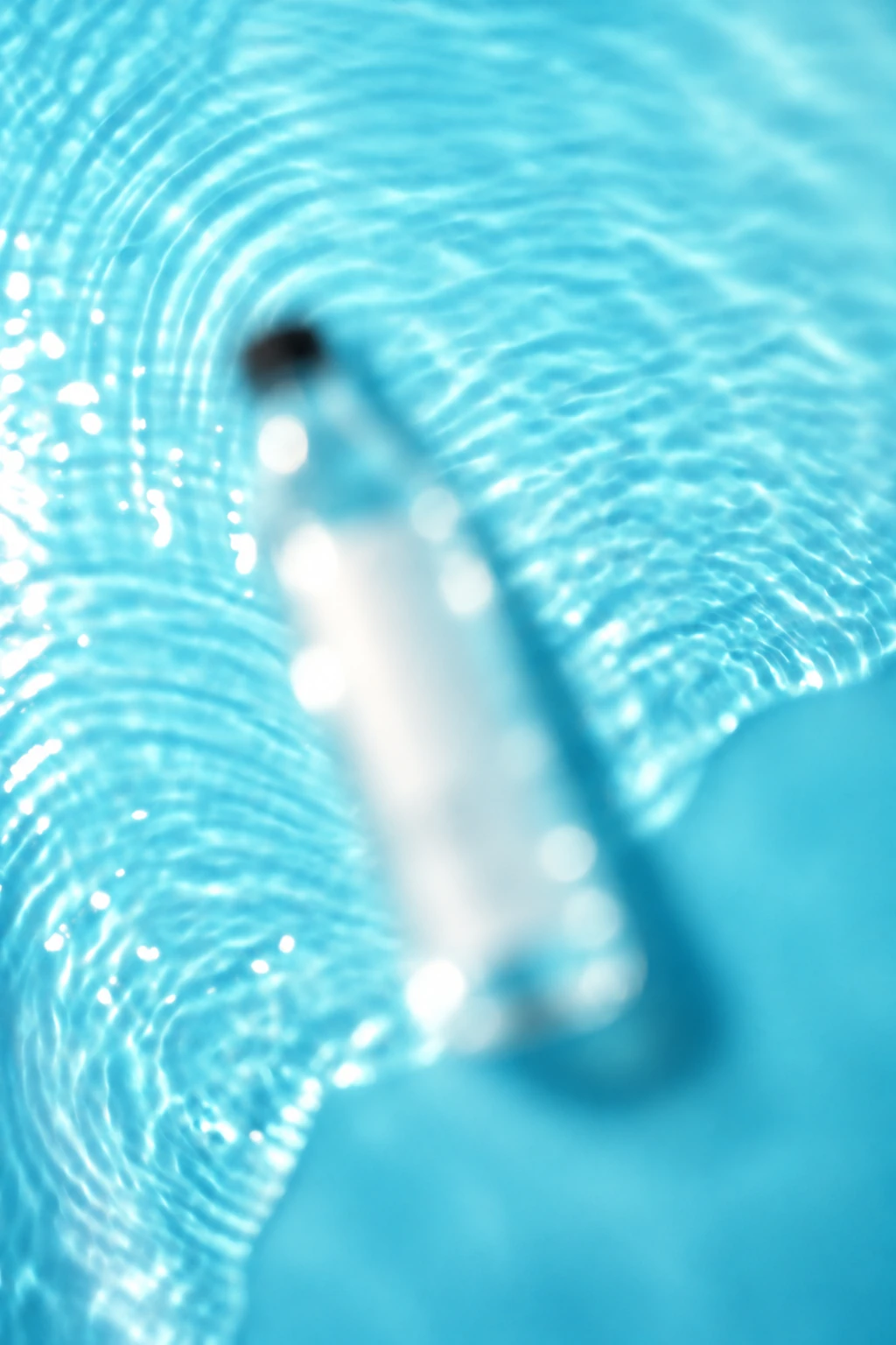 Blurred WAVARA product teaser in blue water